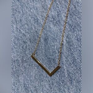 Letter L necklace.